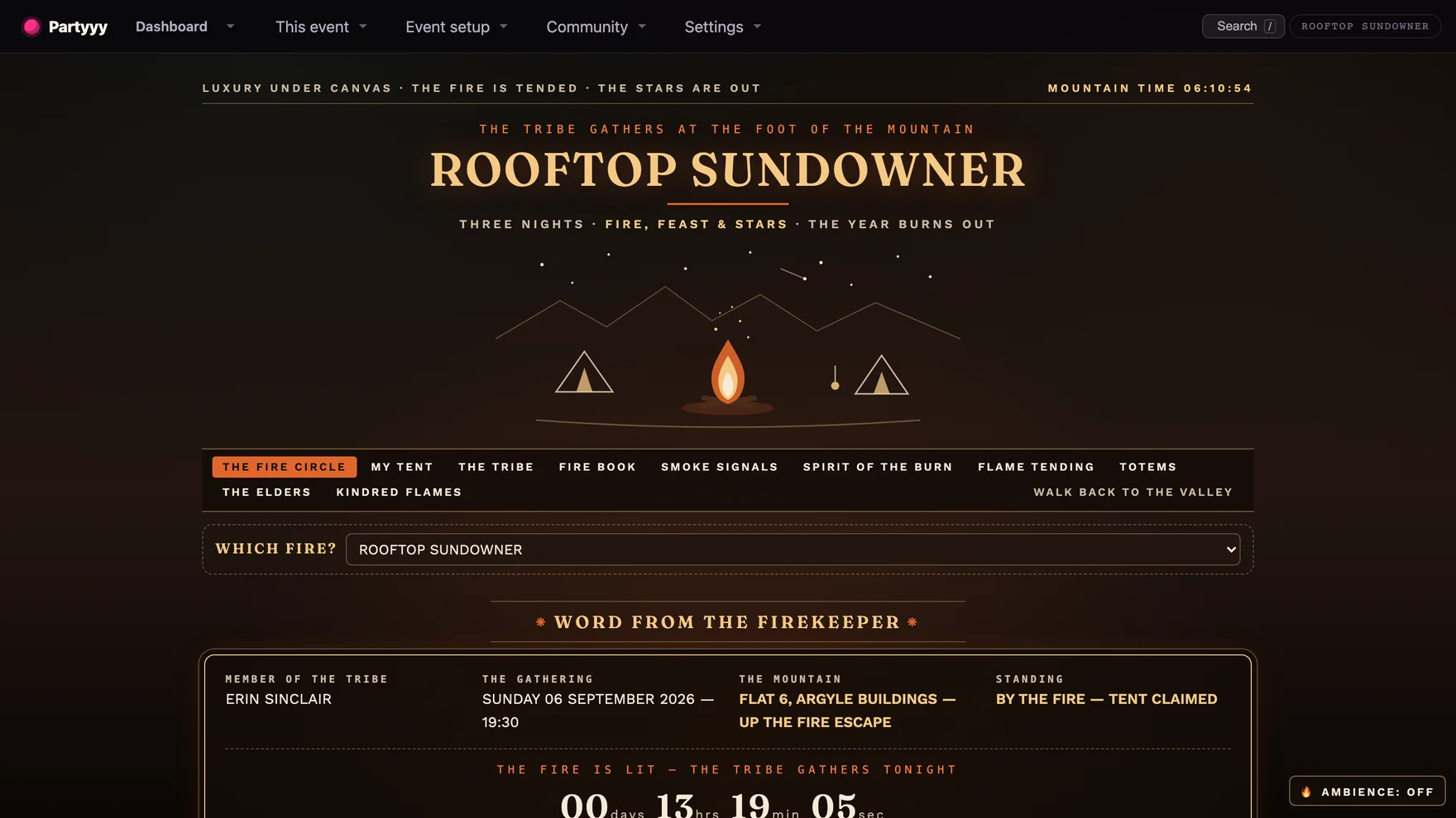 The Tribal Burn hub — a bonfire on a mountain ridge under starlight